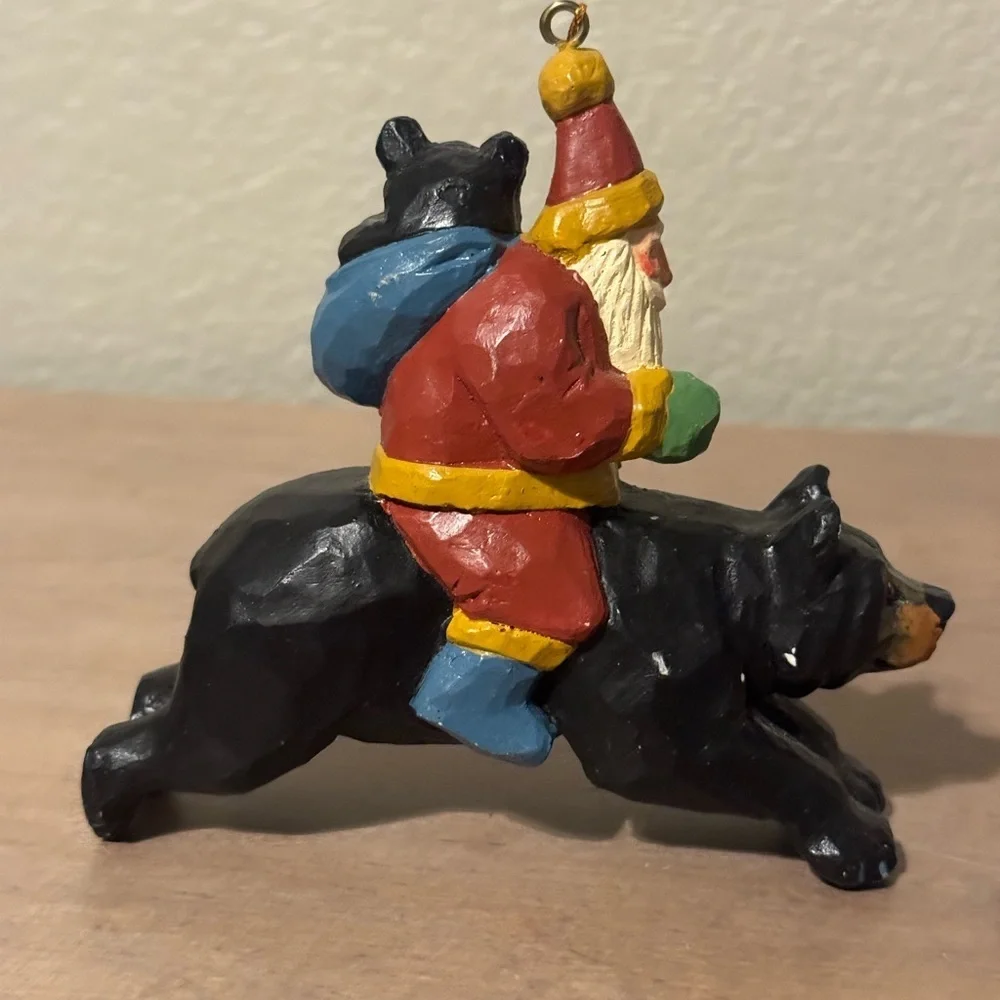 House of Hatten Santa Riding Black Bear Figurine